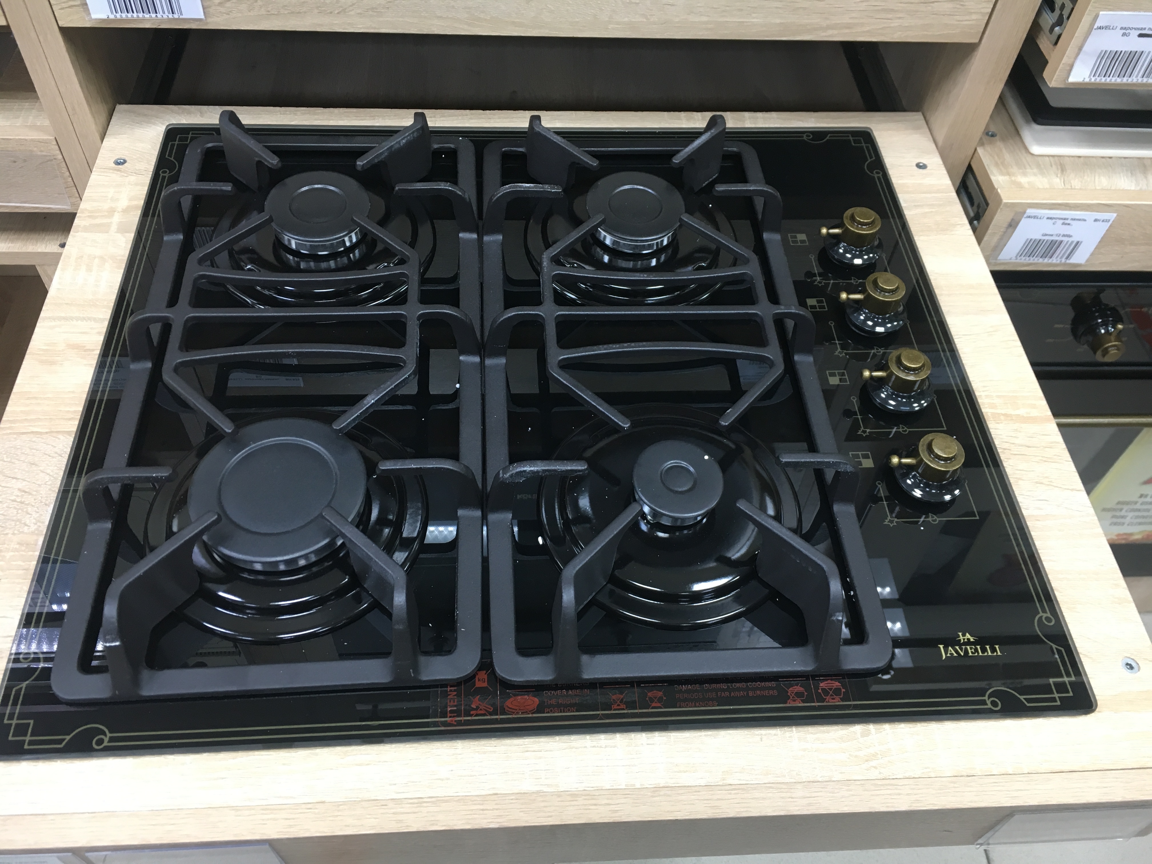 JAVELLI  варочная панель     ST 640 B  стекло черн./брнз,ручки сбоку  _